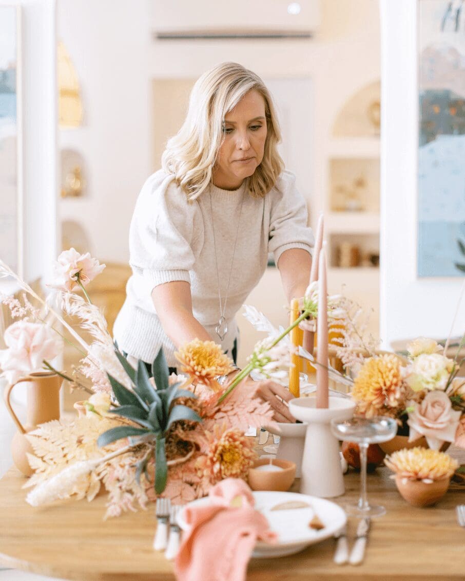 Wedding stylist, styling a table for a wedding